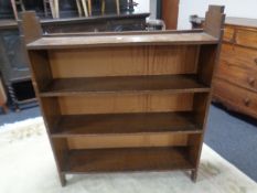 A set of Art Deco open book shelves.