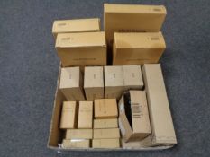 A box containing Volkswagen group car parts including, air filters, oil filters, injectors etc.