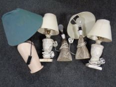 A box containing a pair of pottery table lamps,