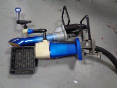 Two electric beer pumps, Tetleys and Fosters.