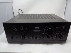 A Sansui AU-717 integrated amplifier.