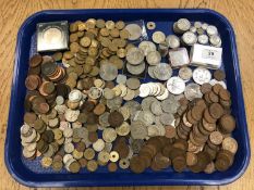 A tray of mainly British coins including George V silver florins and shillings,