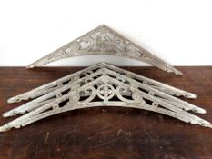 A set of four 19th century cast iron brackets.