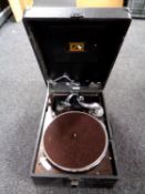 An HMV portable tabletop gramophone.