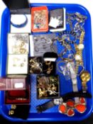 A tray containing a quantity of assorted costume jewellery and wristwatches including Rotary.