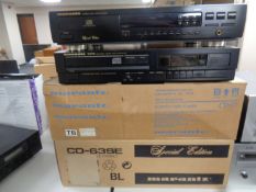 A Marantz CD-63SE CD player with remote together with a Marantz CD-75 monitoring CD player with