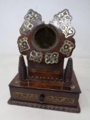 A Regency rosewood pocket watch desk stand inlaid with mother-of-pearl. 16 cm x 19 cm.