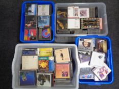 Four crates and a bag containing various CDs.