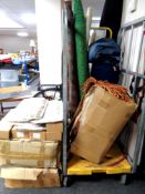 Three boxes containing Duresta trim fabric trim together with five rolls of material.