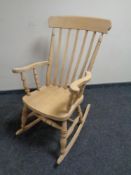 A pine farmhouse rocking chair