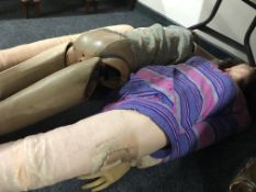 Two St. John's Ambulance medical dummies.