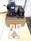 A Bingoscope projector in original box together with three Pathescope reels.