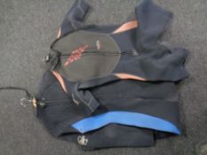 Two wetsuits.