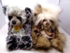 Two Charlie bears, Higgins and Whoopsie Daisy.