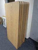 Seven 5' trestle tables.