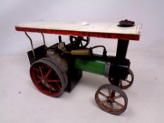 A Mamod steam tractor.