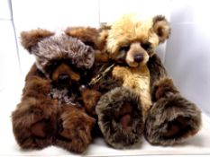 Two Charlie bears,