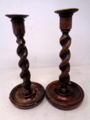 A pair of Edwardian barley twist candlesticks.