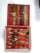 A box containing Taiwanese brass cutlery.