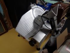 A commercial meat slicer.