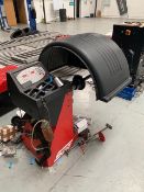 A Snap-ON Sun model SWB 100 Wheel Balancer.