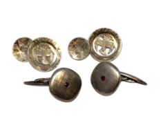Two pairs of silver cuff links.