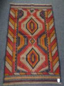 A Baluchi rug 140cm by 87cm