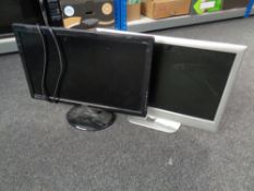 A Benq computer monitor together with an Alba 22