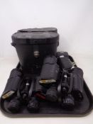 Two sets of Aico ZCF 10x50 field glasses, together with two digital cameras.