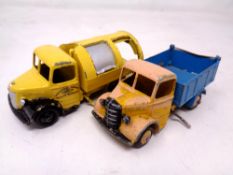 Two vintage Dinky Bedford vans.