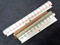 Four fabric roller blinds.