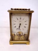 A brass cased German 12 jewel carriage clock by Schatz.
