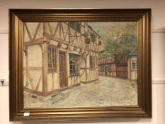 Continental School : A view along a town street, oil-on-canvas, 89 x 66 cm.