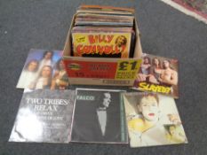 A box containing vinyl LPs and 12
