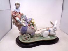 A Lladro figure, Easter Fantasy no.1810 on plinth.