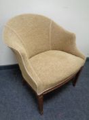 An Art Deco style tub chair.