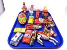 A tray of tin plated vehicles,