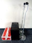 A Sony subwoofer with surround kit and stands.