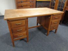 A 20th century twin pedestal writing desk.