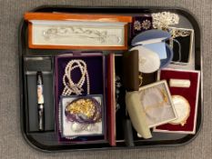 A large tray of costume jewellery, beads, necklaces etc.