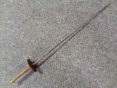 A fencing epée marked A-Solingen with a tooled leather hand guard.