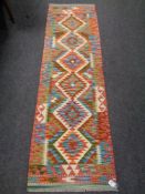 A Chobi kilim runner 200cm by 62cm