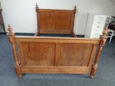 A pitch pine 4' bed frame.