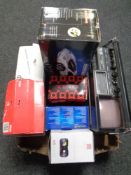 A box containing a radio/cassette AM/FM radio in the form of a car, a virtual reality headset,