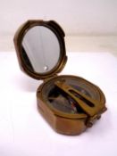 A Stanley of London brass pocket compass.