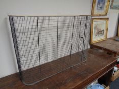 A 19th century wrought iron and brass fire guard (width 108cm).