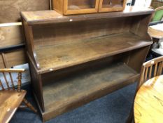 A set of Edwardian oak shop display shelves.