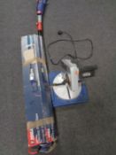 A Spear & Jackson electric pole saw together with an electric chop saw.