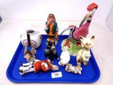 A tray containing a Goebel figure of a bird together with further figures including Franklin