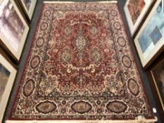 A machined Keshan design rug 162 cm x 240 cm